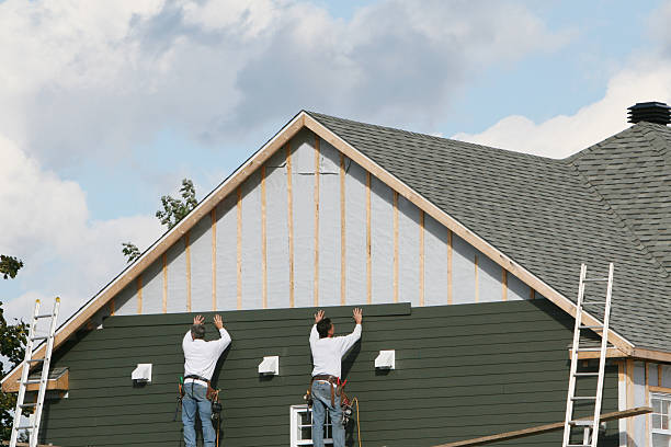 Professional Siding technician working in Hilltown, PA